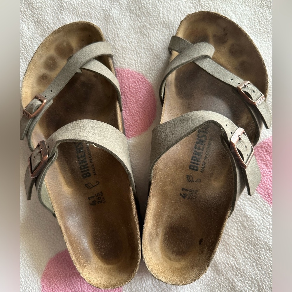 Taupe Birkenstock sandals.